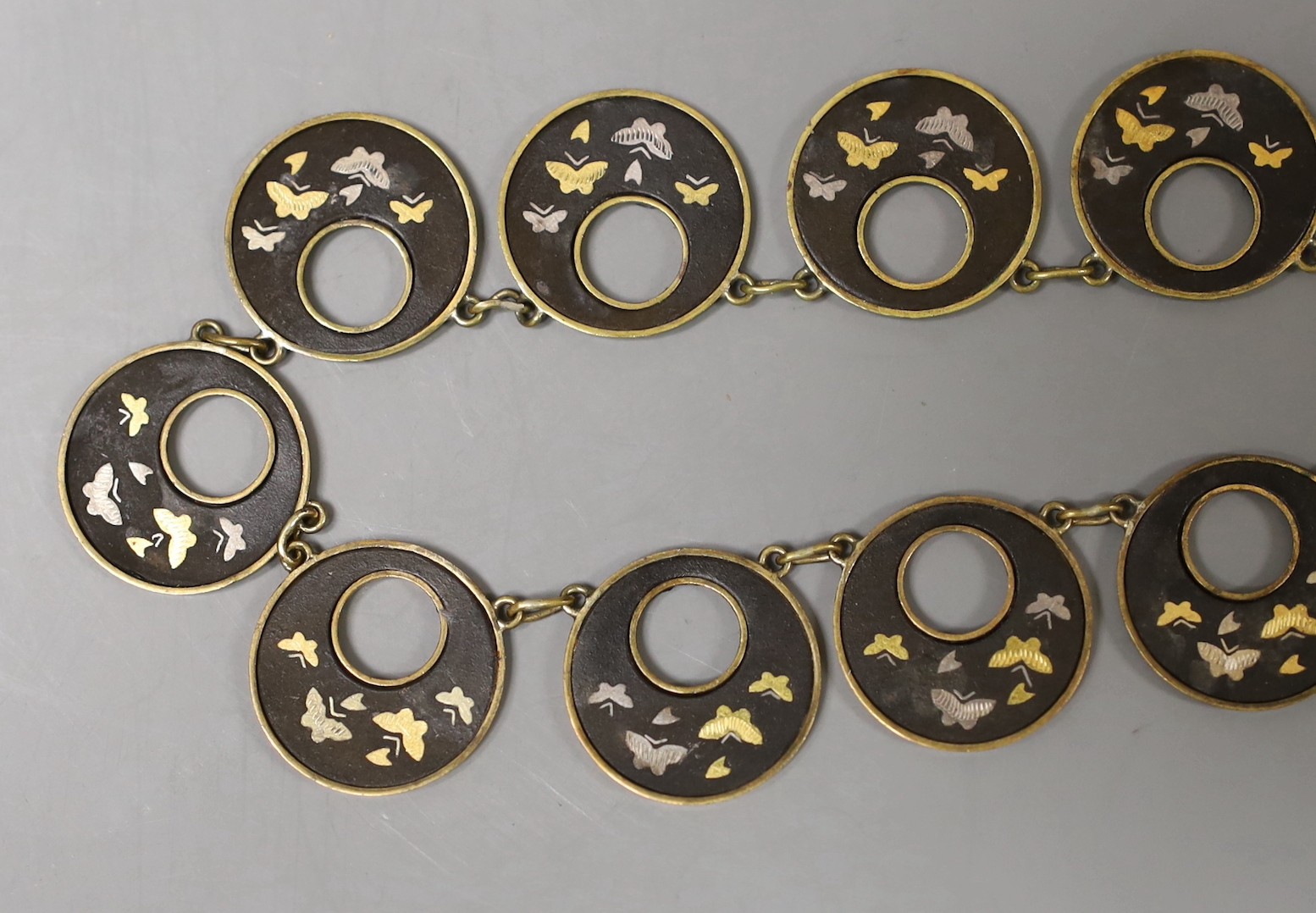 A Japanese mixed metal necklace, early 20th century